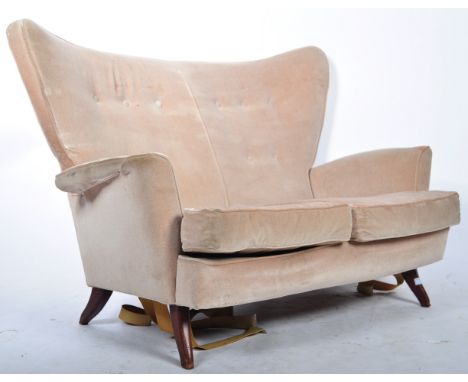 E Gomme - G Plan - A 1950's mid 20th Century retro vintage two seater sofa settee having a shaped wingback with button back u