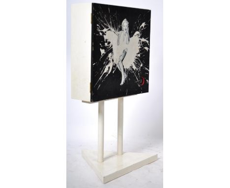 An unusual 20th Century retro vintage hand painted free standing cocktail cabinet storage unit of rectangular form. The cabin