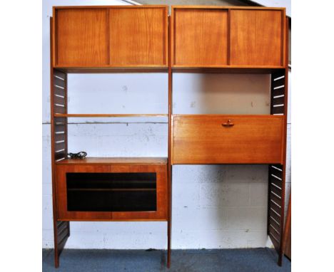 Robert Heal - Staples - Ladderax - An original retro vintage 1970's 20th century teak wood modular wall unit comprising of tw