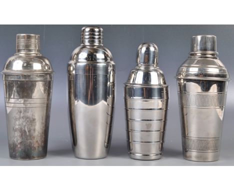 Two 20th Century Art Deco vintage silver plated cocktail shakers of simple form with one having engine turned decorated body 