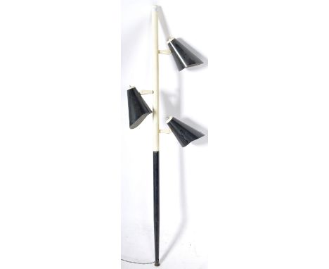 An unusual 20th Century retro vintage spot lamp light of metal construction having three adjustable black finished shade. Rai