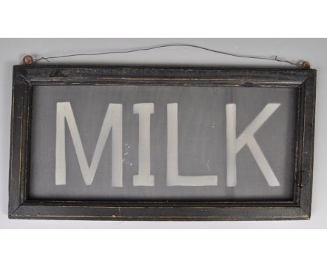 An early 20th Century vintage advertising point of sale shop display sign for Milk. The sign having a mesh center with 'MILK'