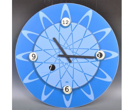Coriena van Gorsel - Koziol - a West German made retro vintage designer wall clock by Koziol, featuring a space-age design by