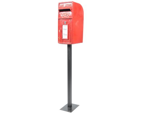 A contemporary vintage style cast iron and tin functional model of an ER post box / letter box. Full size with opening door t