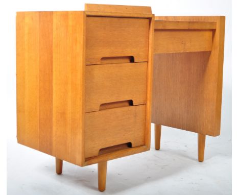 John &amp; Sylvia Reid - Stag Furniture - C Range - An original 1950's retro vintage light oak dressing table desk having a f