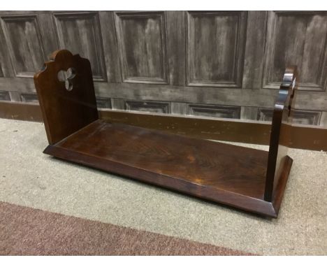 LATE 19TH CENTURY ROSEWOOD BOOK TROUGH, with pierced trefoil handles, on castors, 80cm wide