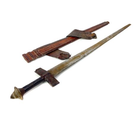 EARLY 20TH CENTURY AFRICAN TAKOUMBA SWORD, with fullered steel blade, leather crossguard and handle, and leather scabbard, 96
