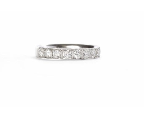 PLATINUM DIAMOND HALF ETERNITY RING
set with a row of ten round brilliant cut diamonds, size K