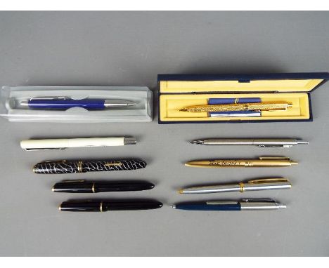 A collection of pens and propelling pencil to include Parker, a Conway Stewart 24 with 14ct nib and similar.Condition Report: