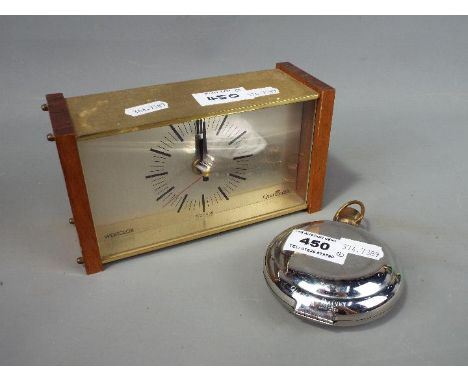 A Dalvey St Elmo travel alarm clock and a Westclox mantel clock. [2]