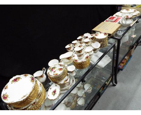 Royal Albert - A large quantity of Royal Albert Old Country Roses dinner and tea ware to include dinner plates, side plates, 