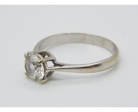 A hallmarked 18ct white gold solitaire ring, size R, approximately 2.99 grams all in.