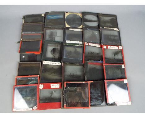 A collection of thirty six 3¼" sq magic lantern slides, varying images to include castles, boats, architectural and similar.