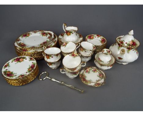 Royal Albert - A quantity of Royal Albert Old Country Roses dinner and tea wares comprising 8 dinner plates, 8 side plates, 8