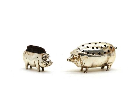 A silver novelty pen wipe, in the form of a standing pig, 7.5cm long, together with a larger silver novelty cocktail stick st