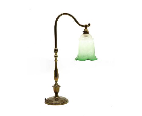 An Edwardian design table lamp, the brass column fitted green etched glass shade, 51cm high, together with a pair of Edwardia