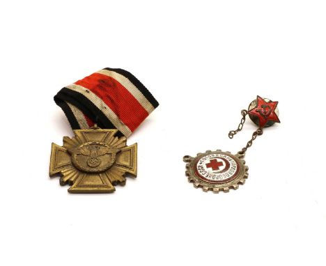 Two medals - Nazi 10 year long service and Russian Army Medics, (?) with a stripped ribbonCondition report: Nazi medal had ta