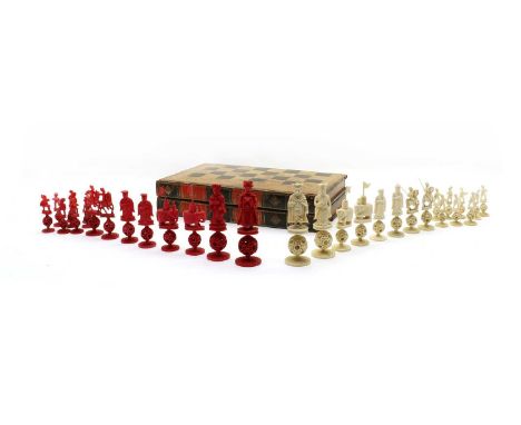 A Cantonese export ivory chess set, early 19th century, red stained and natural, the natural side as George lll and Queen Cha