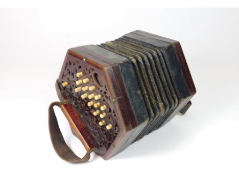 LACHENAL CONCERTINA. A Lachenal & Co., London concertina, with 31 bone buttons & pierced rosewood ends. Paper labels & bearin