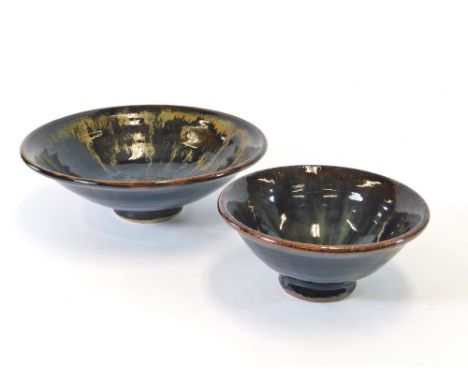 AMANDA BRIER. Two footed bowls by Amanda Brier. Impressed marks. Largest, has Leach Pottery & personal mark, diameter 21cm.  