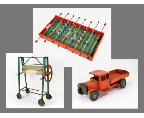 TRI-ANG ETC. A 1930s Tri-Ang lorry for Lines Bros. Ltd., length 49cm., & a Tri-Ang toy mangle (one shelf missing), height 48c