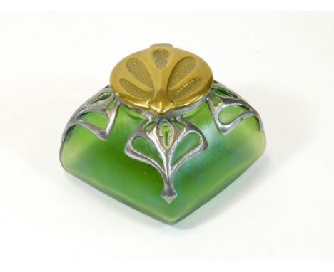 INKWELL. A pewter mounted, iridescent green glass inkwell. Width 8cm.  Please note that all items in this auction are previou