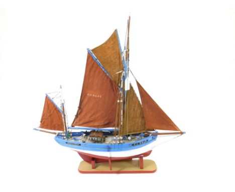 FISHING BOAT MODEL. A Concarneau tuna boat model, made by a Free French fisherman, M. Le Doeuff. (Given to the Newlyn Pilchar