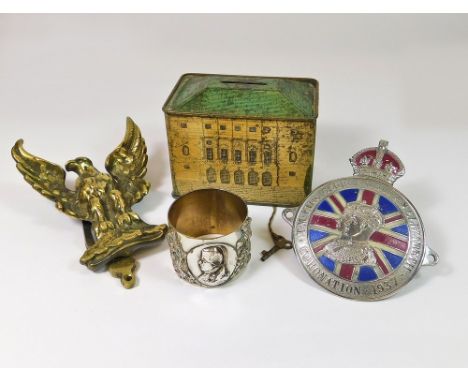 MISCELLANEOUS. A Queen's Dolls' house tin issued by Chubb & Sons, with key. Also, a 1937 Coronation souvenir car badge, a bra