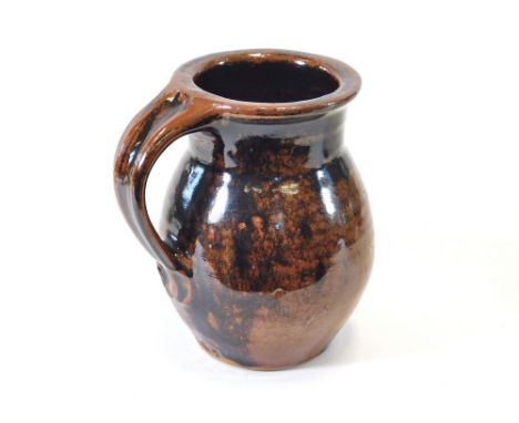 TREVOR CORSER. A pitcher by Trevor Corser. Personal & Leach Pottery marks. Height 17cm.  Please note that all items in this a
