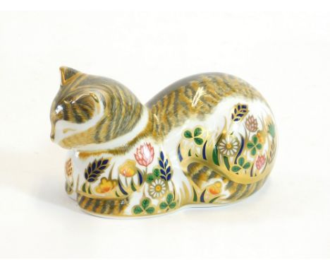 ROYAL CROWN DERBY. A Royal Crown Derby 'Cottage Garden Cat' paperweight with gold button. Length 10cm.  Please note that all 