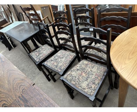 A JACOBEAN STYLE GATE-LEG TABLE PLUS SIX LADDER BACK DINING CHAIRS