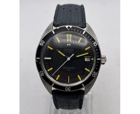 A 1960'S VINTAGE OMEGA SEAMASTER 120 AUTOMATIC DIVERS WATCH. 38MM ON A TROPICAL DIVERS STARP WITH OMEGA BUCKLE. WORKING AT TH