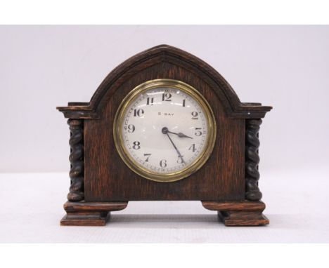 A RARE ANTIQUE FRENCH EIGHT DAY MANTLE CLOCK IN A SOLID WOOD CASE WITH BARLEY TWIST COLUMNS CIRCA 1910 - IN WORKING ORDER AT 