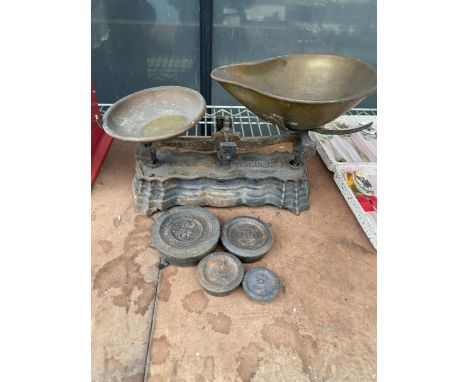 A SET OF VINTAGE BALANCE SCALES AND WEIGHTS