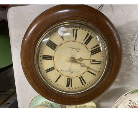 A VINTAGE, MAHOGANY CASED WALL CLOCK WITH WEIGHTS AND PENDULUM