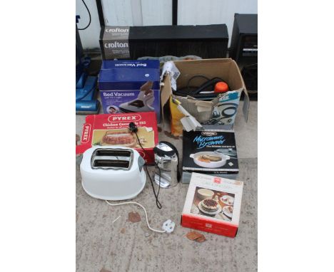 AN ASSORTMENT OF ITEMS TO INCLUDE A TIN OPENER,A BUFFET SERVER AND A BED VACUUM ETC