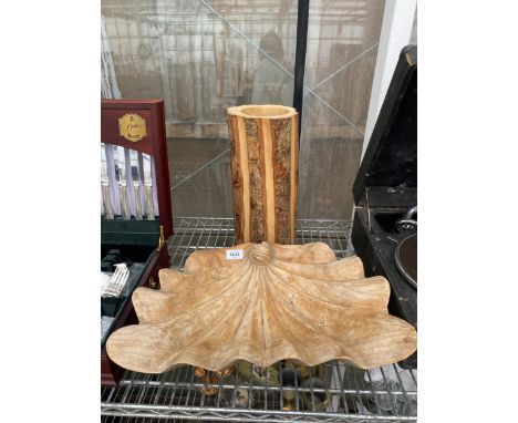 A DECORATIVE CARVED BOWL AND A CARVED LOG STICK STAND