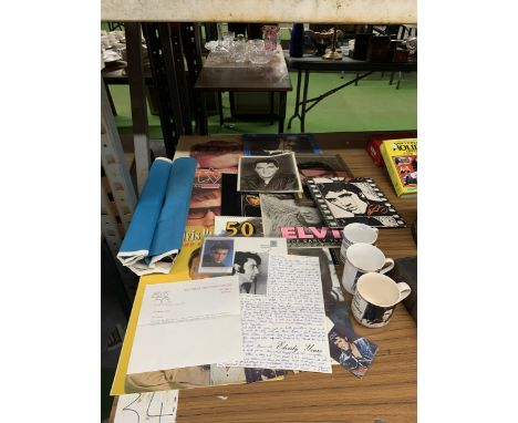 A LARGE COLLECTION OF ELVIS PRESLEY EPHEMERA TO INCLUDE CALENDARS, MUGS, PICTURES, A LETTER, ETC