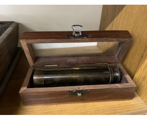 A BOXED BRASS TELESCOPE