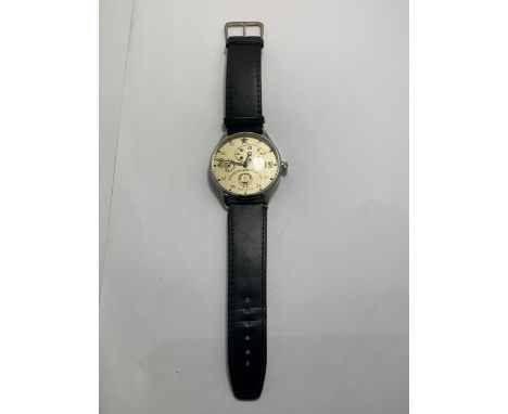 A VINTAGE CCCP RUSSIAN WRIST WATCH WITH BLACK LEATHER STRAP SEEN WORKING BUT NO WARRANTY GIVEN