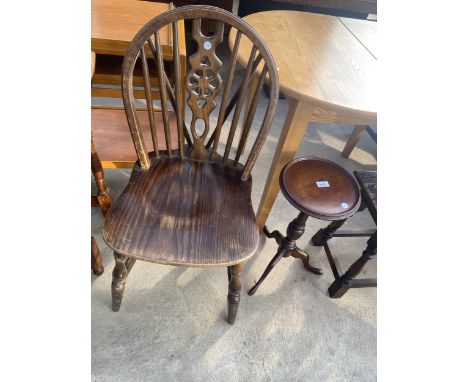 A MAHOGANY TRIPOD WINE TABLE AND WHEEL BACK DINING CHAIR