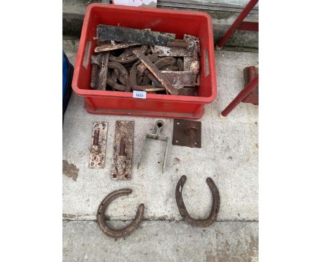 AN ASSORTMENT OF VINTAGE GATE HINGES AND HORSE SHOES