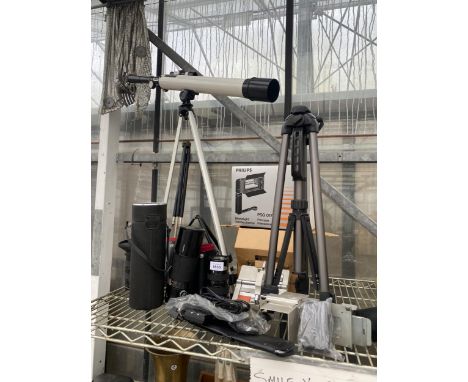AN ASSORTMENT OF PHOTOGRAPHY ITEMS TO INCLUDE LENS' TRIPODS AND A TELESCOPE ETC
