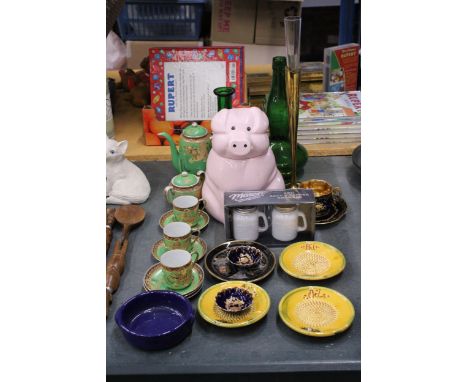 A LARGE PIG BISCUIT BARREL, MASON CRUET SET, ORIENTAL COFFEE POT WITH CUPS AND SAUCERS, TWO GREEN GLASS VESSELS ETC.
