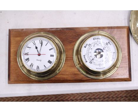 A NAUTICAL CLOCK WITH BAROMETER AND DUAL THERMOMETER AND HYGROMETER