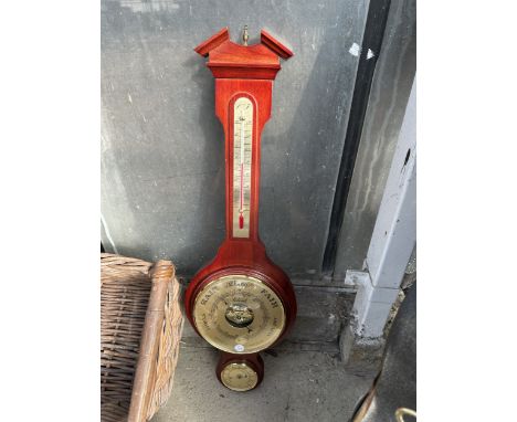 A BAROMETER/ THERMOMETER