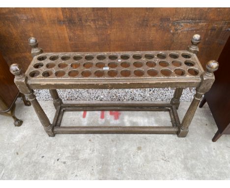 A VICTORIAN PAINTED 39 DIVISION STICK/UMBRELLA STAND, 49" WIDE