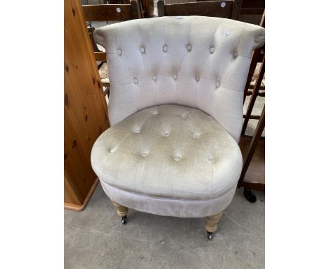 A 'NEXT' BUTTON BACK BEDROOM CHAIR ON TURNED FRONT LEGS