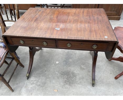 A 19TH CENTURY MAHOGANY AND CROSSBANDED SOFA TABLE WITH TWO DRAWERS AND TWO SHAM DRAWERS