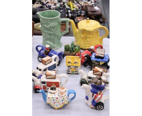 A COLLECTION OF CARTERS OF SUFFOLK NOVELTY TEAPOTS TOGETHER WITH A VINTAGE WADE JUG AND LINGARD WEBSTER TEAPOT